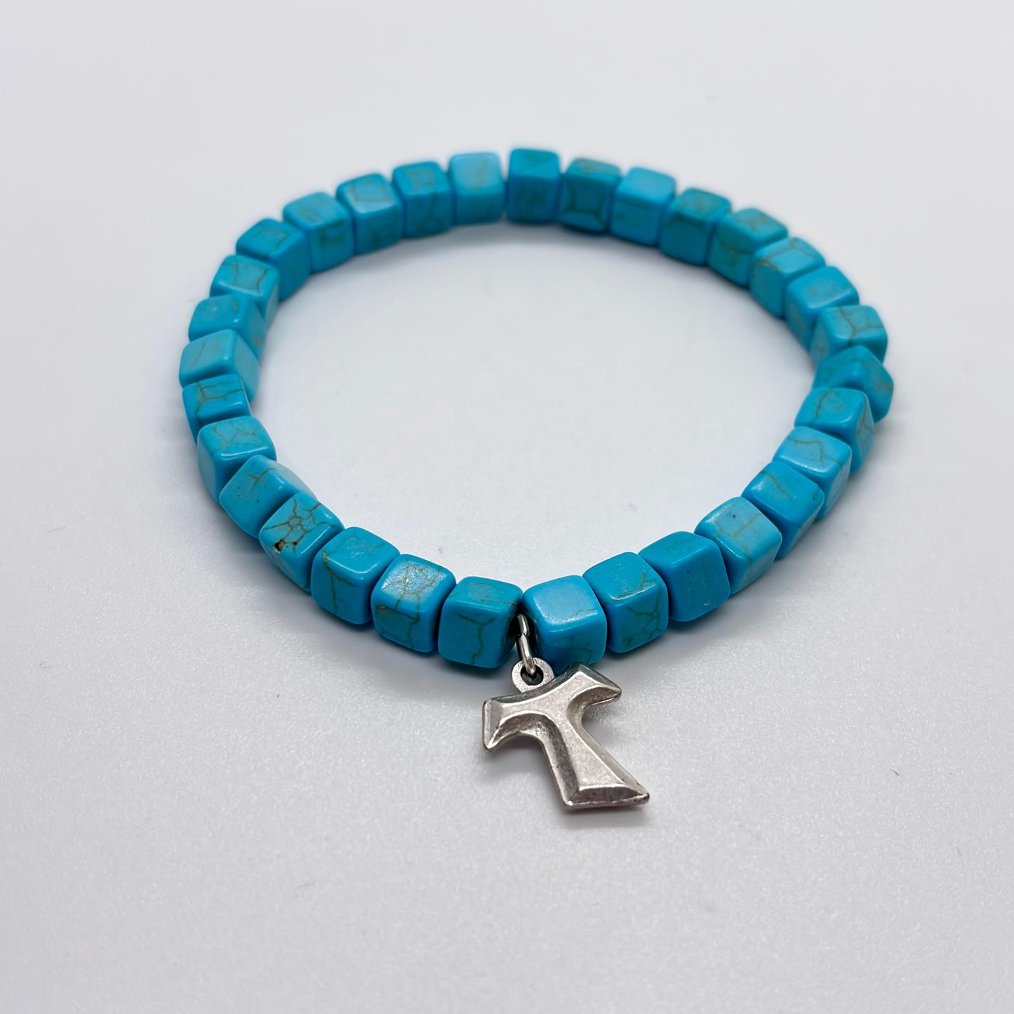 Bracciale turchese e Tau