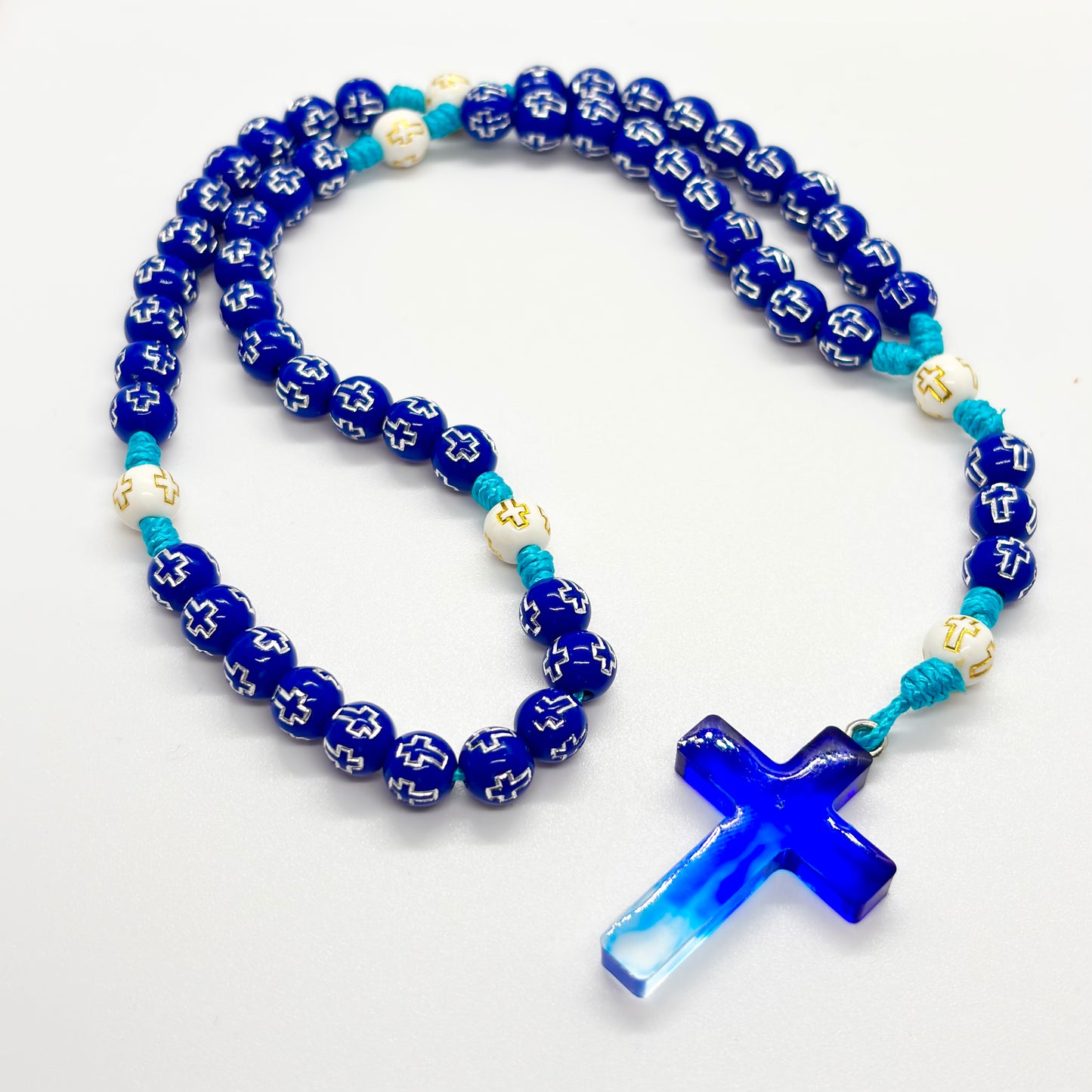 Rosario in corda - Croce in resina colorata